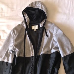 black and silver windbreaker